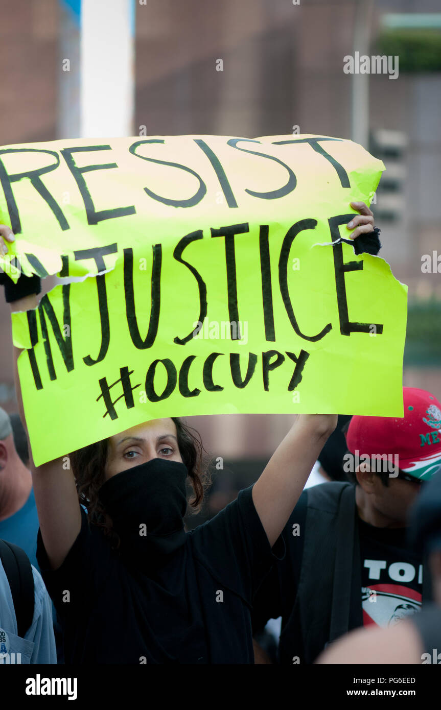 LOS ANGELES - NOVEMBER 17: Occupy LA  protesters march on November 17, 2011 in Los Angeles, CA. Stock Photo