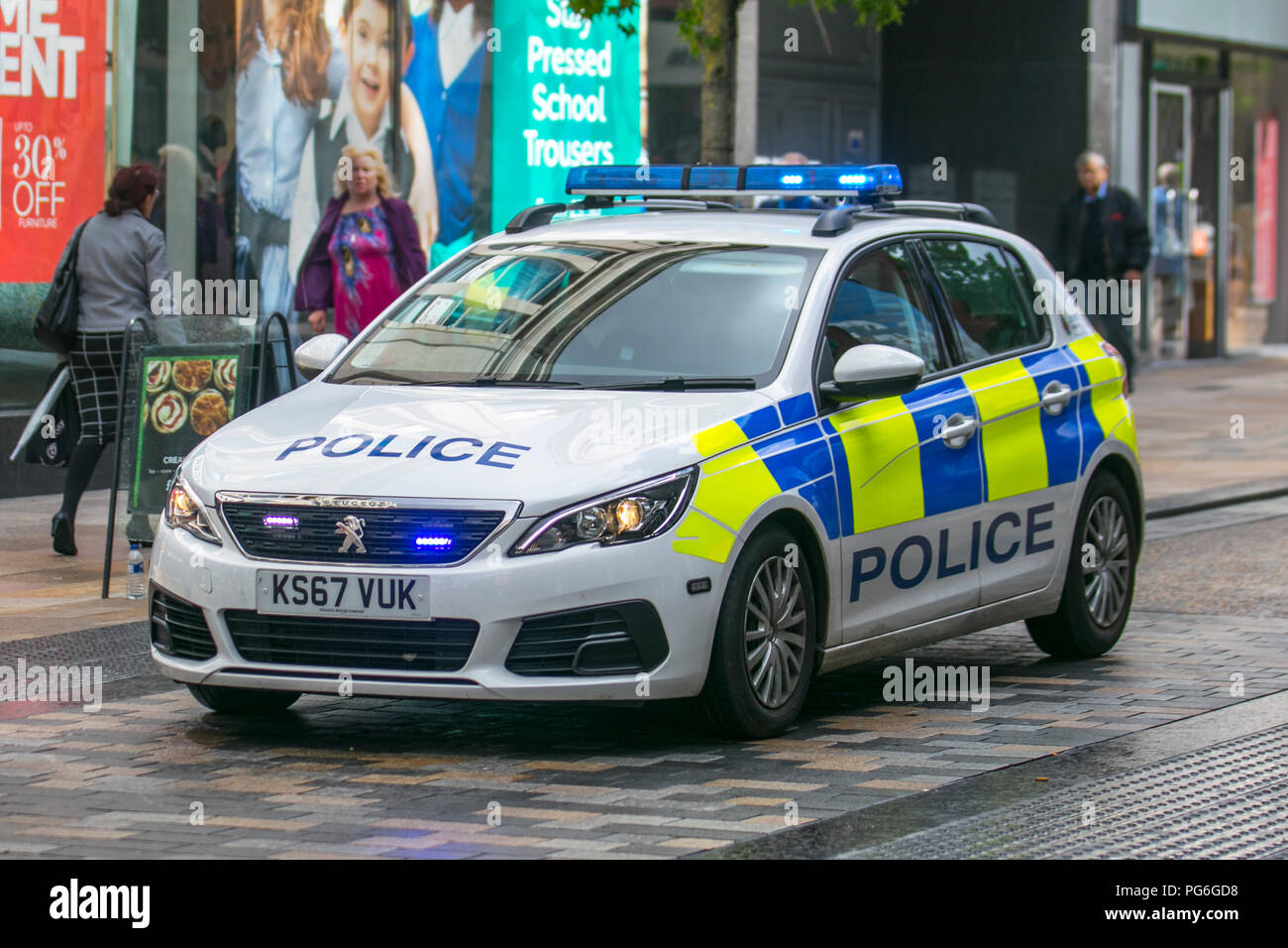 2018 Peugeot 308 Access Blue Hdi S/S; 999 Police emergency response vehicle in Fishergate, Preston, UK Stock Photo