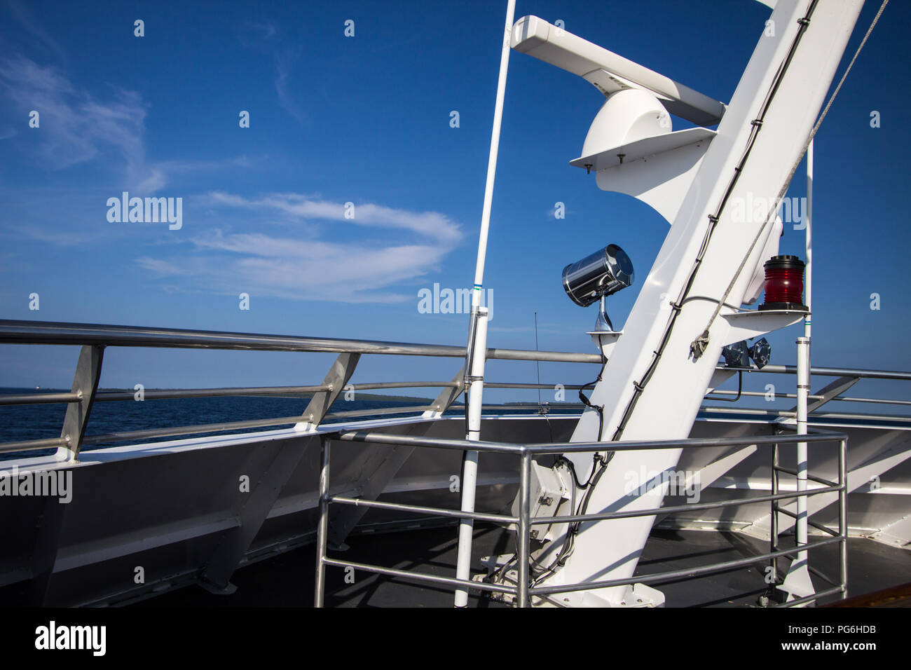 Boat Background. Deck of a large boat on a sunny summer day with blue sky and blue sea horizon Stock Photo
