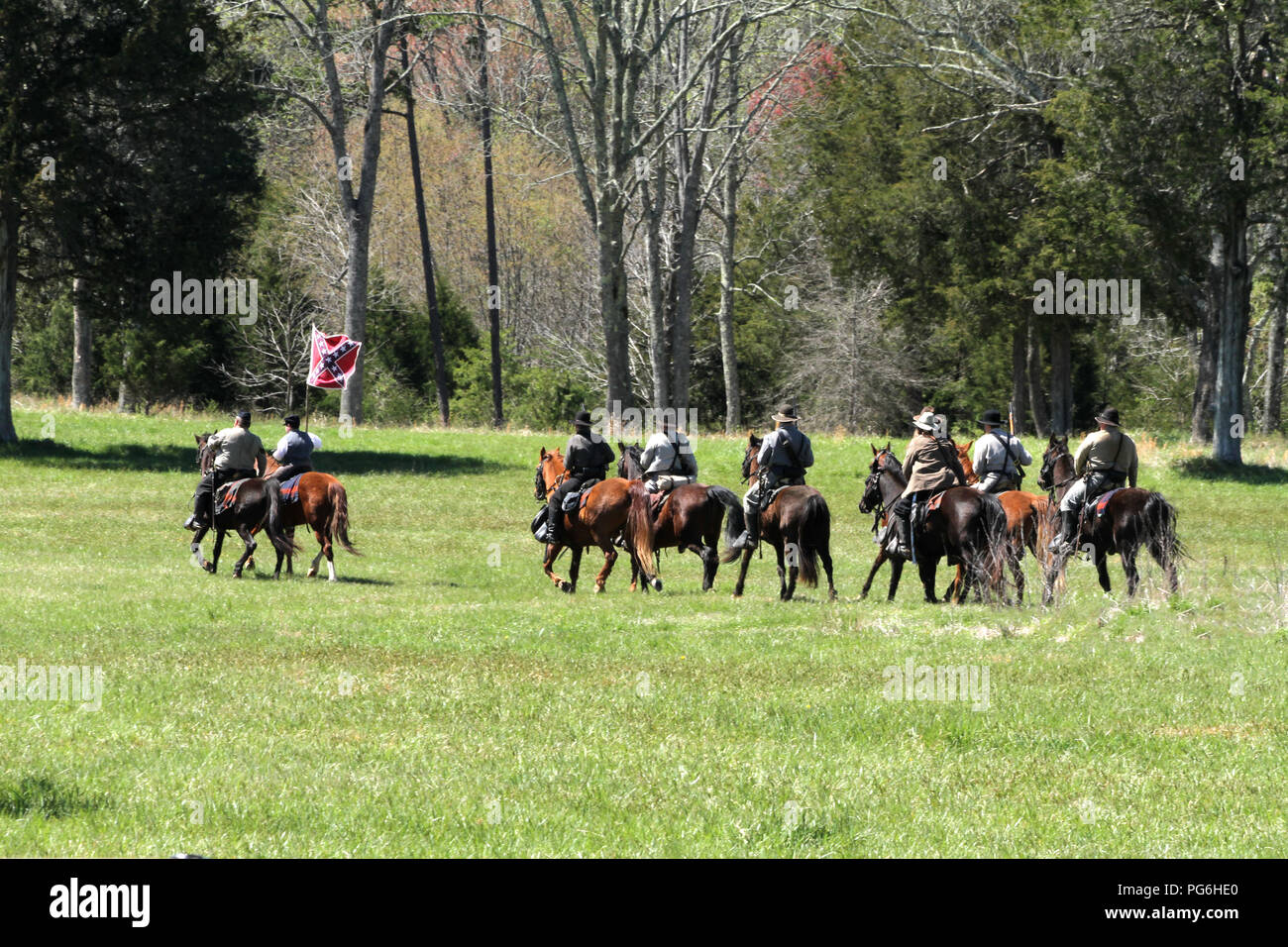 The Confederate States Army (C.S.A.). Cavalry with Confederate flag. Historical reenactment at Appomattox Court House, VA, USA. Stock Photo