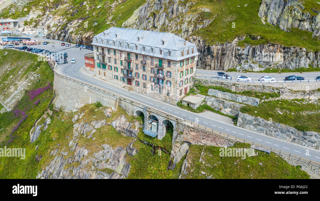 The Furka Pass with an elevation of 2,429 metres (7,969 ft), is a high mountain pass in the Swiss Alps connecting Gletsch, Valais with Realp, Uri. The Stock Photo