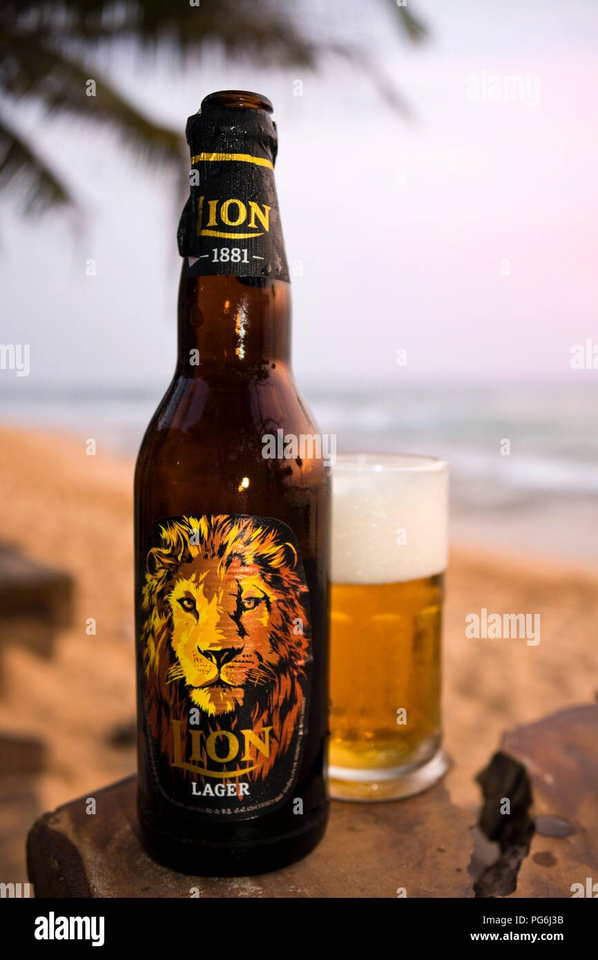 Vertical close up of a bottle of Lion Lager in Sri Lanka. Stock Photo