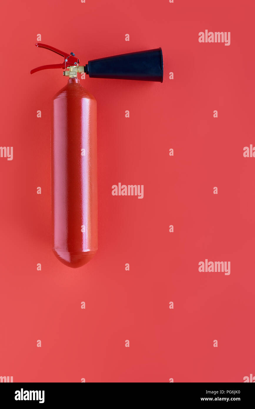 top view of red fire extinguisher isolated on red Stock Photo - Alamy