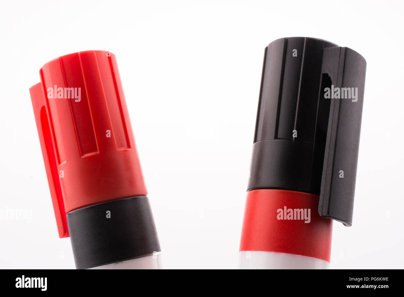 Caps switched color markers side by side on a white background Stock ...