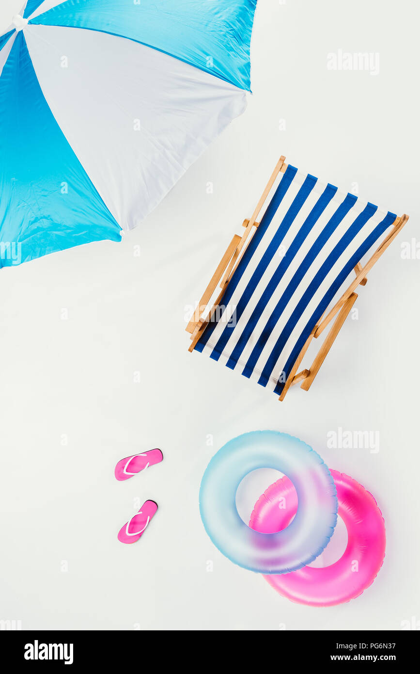 Top View Of Beach Umbrella Striped Beach Chair Flip Flops