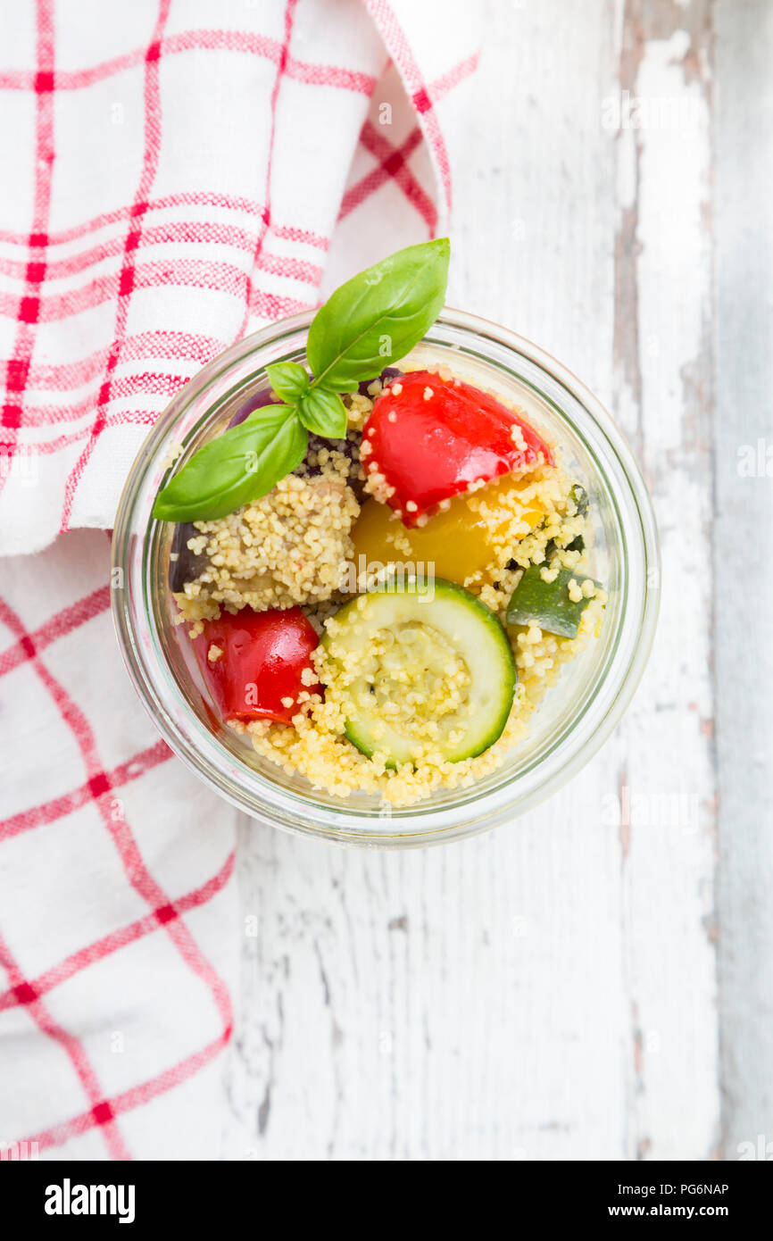 Couscous with grilled vegetables, aubergine, zucchini, paprika, tomato, red onion, rosemary and