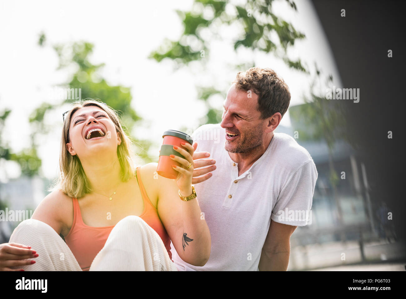 Happy couple having fun outdoors Stock Photo - Alamy