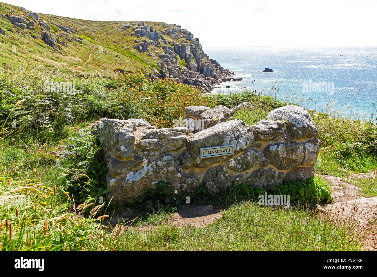 St. Levan's well above Porth Chapel beach, Cornwall, South West England, UK Stock Photo