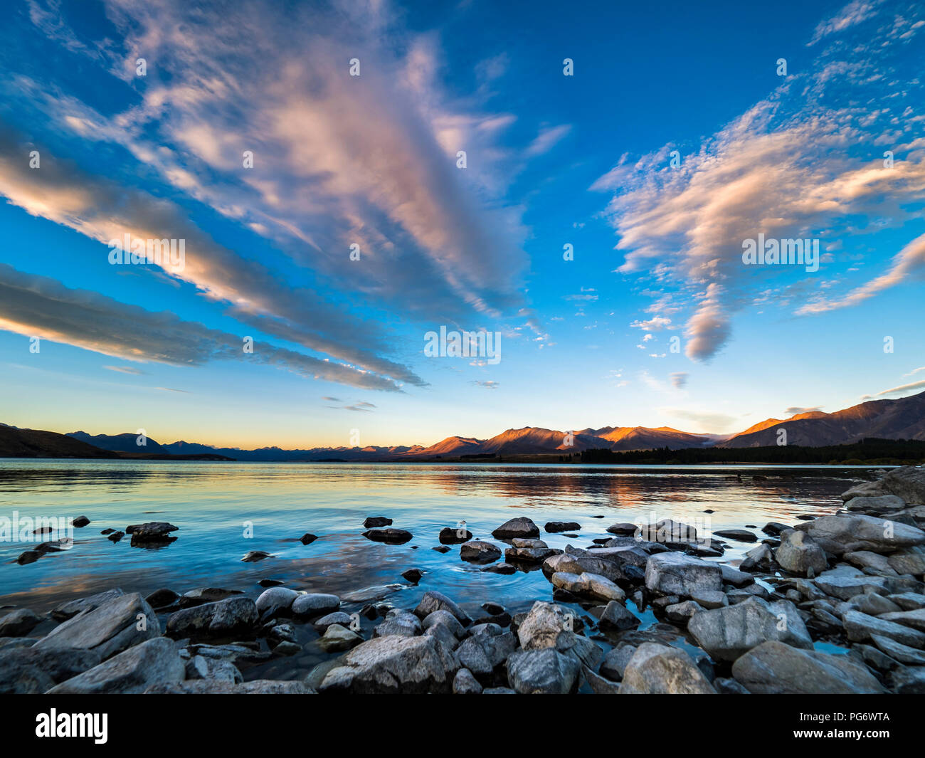 New Zealand, South Island, Canterbury Region, Lake Tekapo at sunset Stock Photo