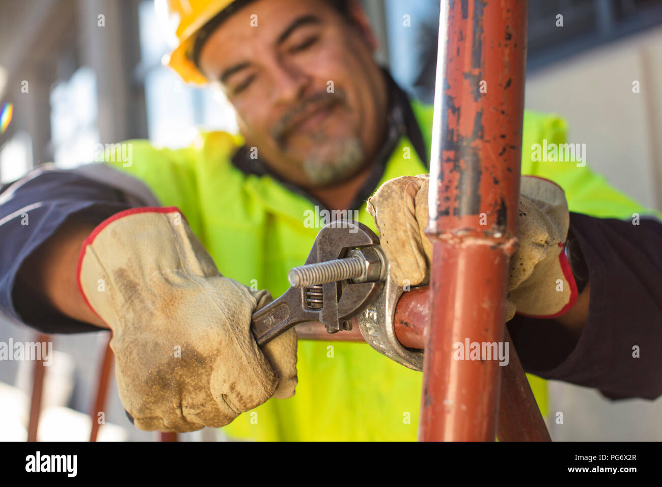 South Africa, Cape Town, Builder tightening a nut Stock Photo Alamy