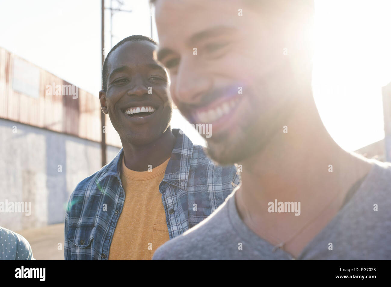 Two happy young men outdoors Stock Photo