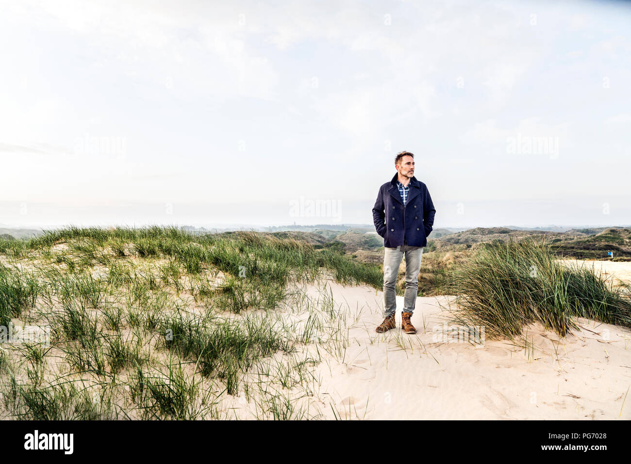Lonely man standing mature hi-res stock photography and images - Alamy