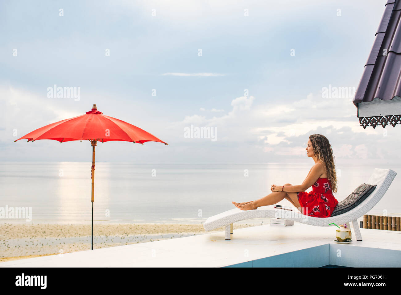 Thailand, Koh Phangan, woman relaxing near the beach Stock Photo