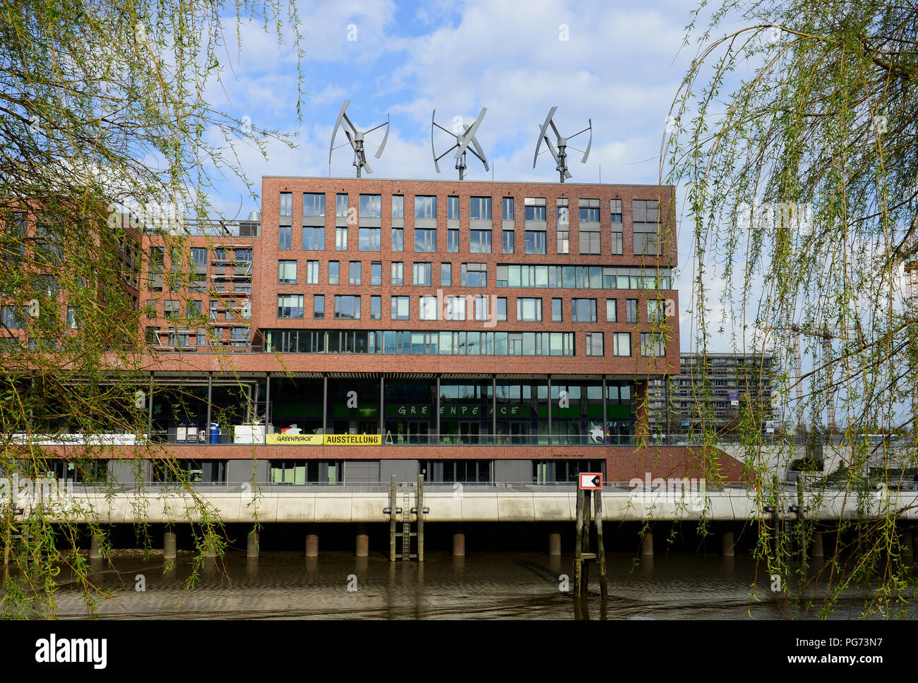 Germany Hamburg Small Wind Turbine On Roof Of Greenpeace Builing In The Hafencity Stock Photo Alamy