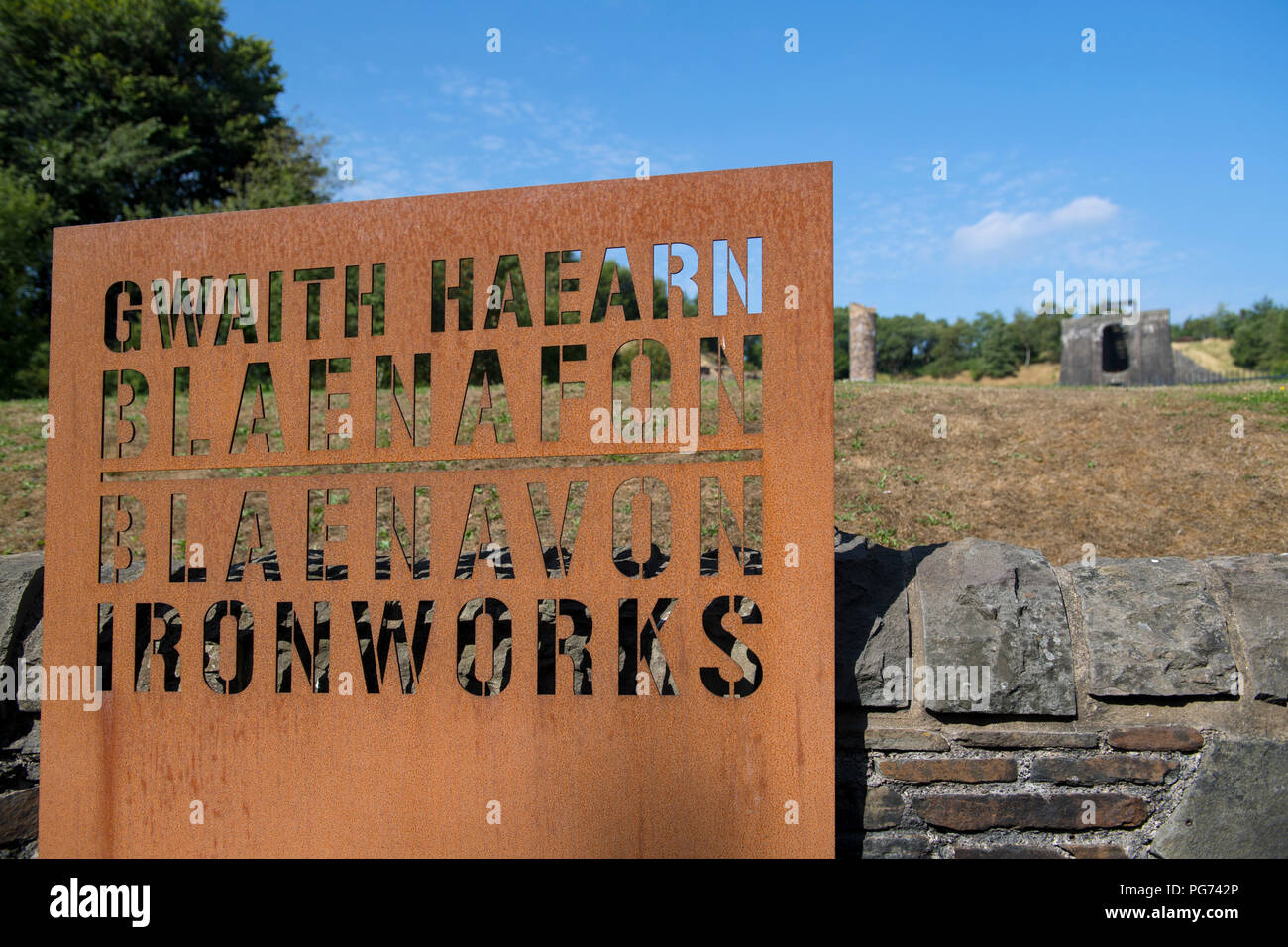 Sign outside the historic Blaenavon Ironworks museum, part of the Blaenavon UNESCO World Heritage Site in Wales, UK Stock Photo