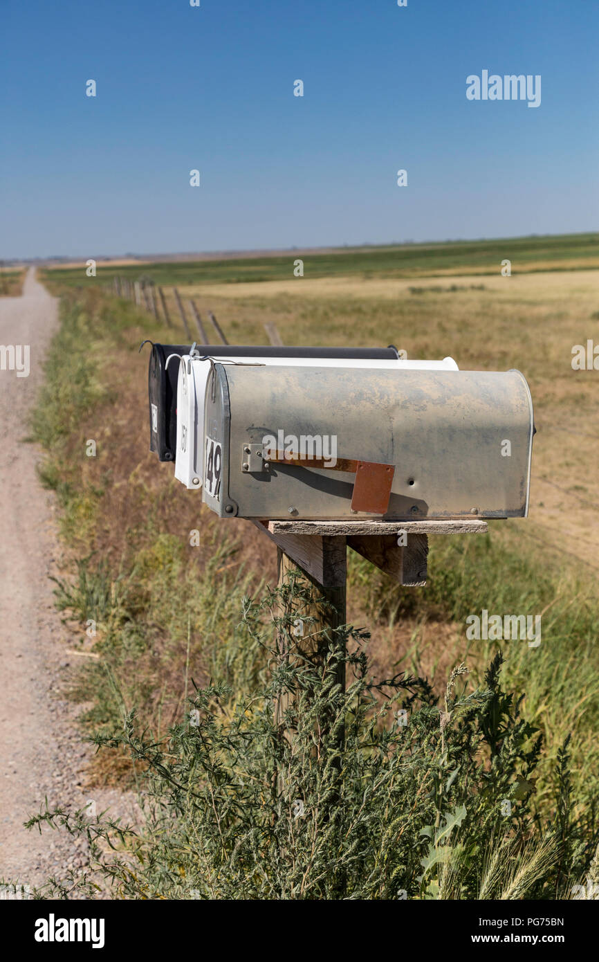 Mailboxes on Rural Unpaved Road in Montana, USA Stock Photo