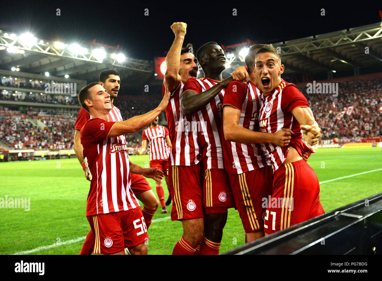 Piraeus, Greece. 23rd Aug, 2018. Players of Olympiacos celebrate the first  goal during the match. After a fascinating match, Olympiacos has won  Burnley, 3-1 at Georgios Karaiskakis in Greece, for the UEFA