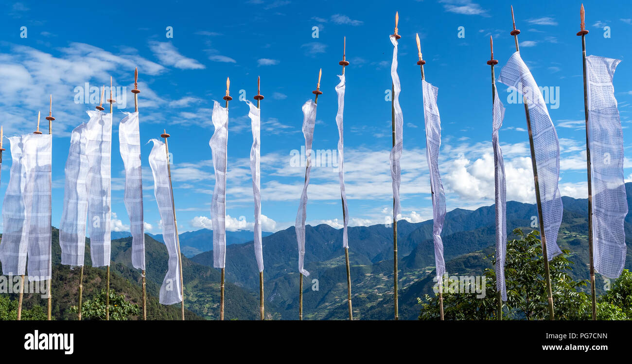 Buddhist Prayer Flags with mountains background - Bhutan Stock Photo