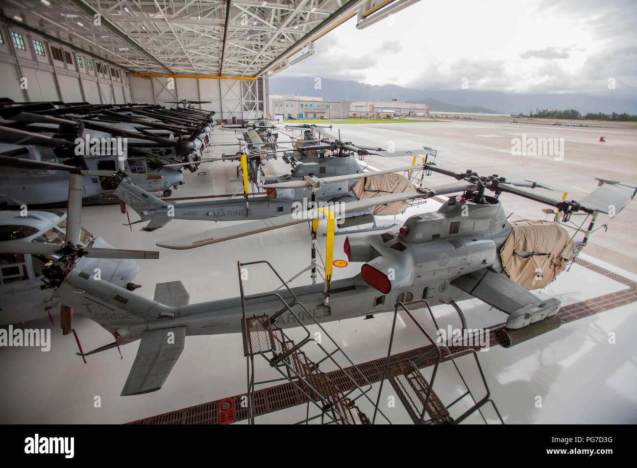 U.S. Marines secure vehicles, aircraft and equipment prior to Hurricane