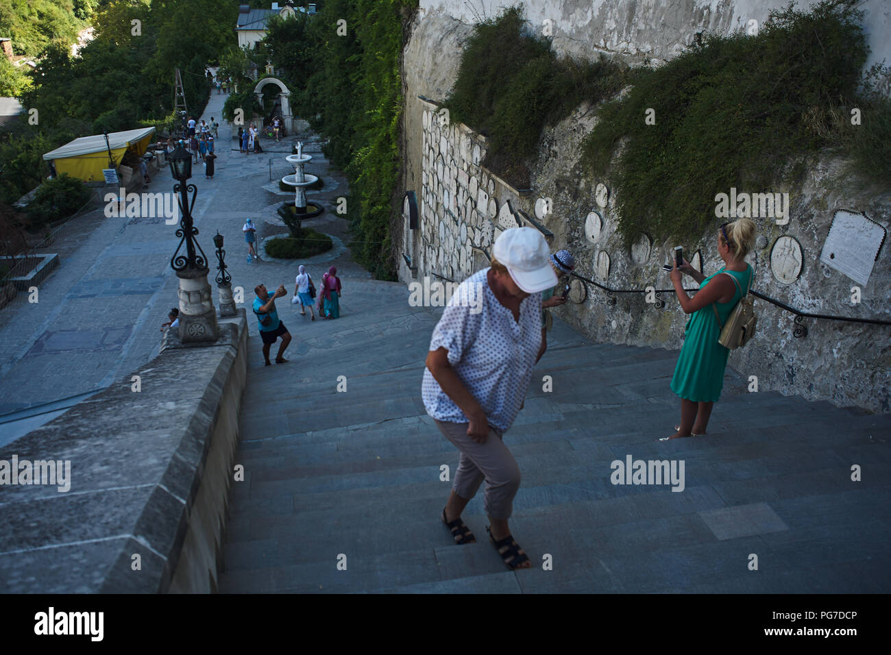 CAVE MONASTERY. pilgrims Stock Photo