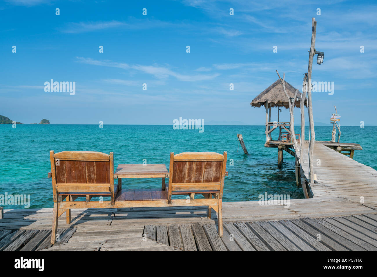 Perfect summer tropical paradise beach with lounge chairs at resort in