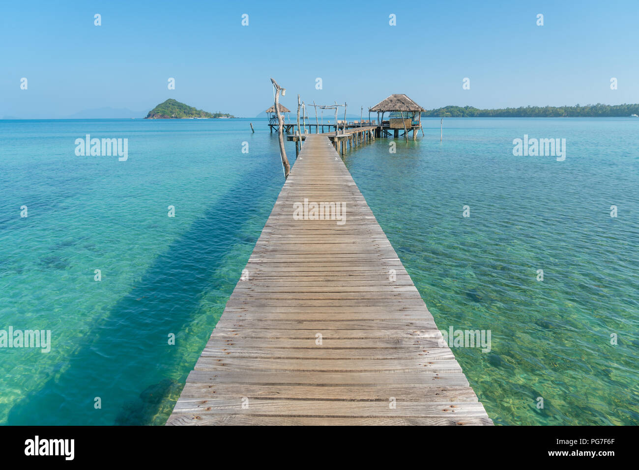 Wooden pier with tropical hut at resort in Phuket, Thailand. Summer, Travel, Vacation and Holiday concept. Stock Photo