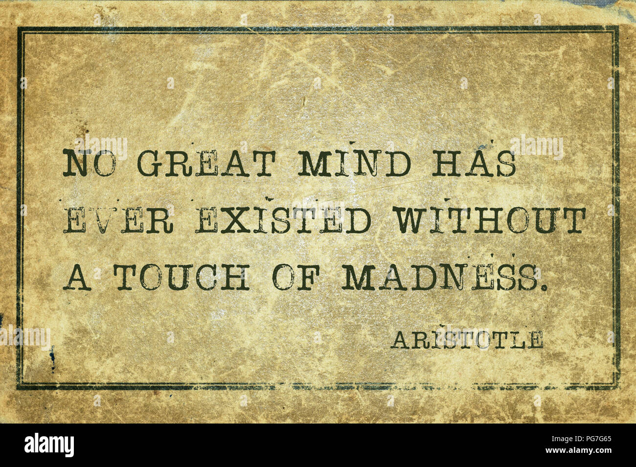 No great mind has ever existed without a touch of madness - ancient Greek philosopher Aristotle quote printed on grunge vintage cardboard Stock Photo