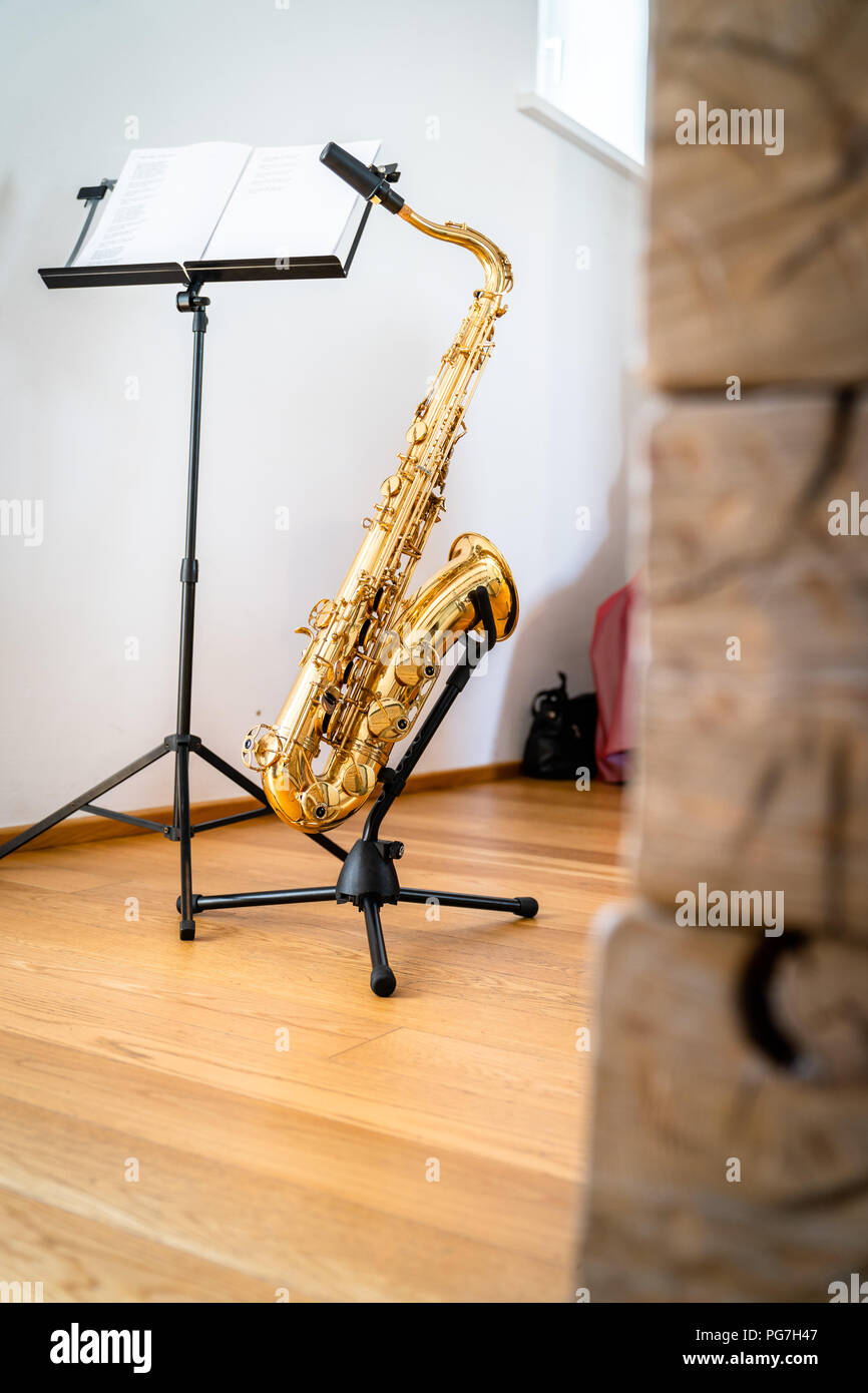 the saxophone stands and is played Stock Photo Alamy