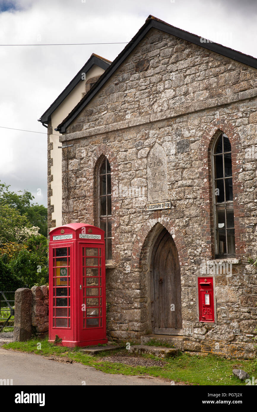 UK, England, Devon, Dartmoor, Belstone village Old Telegraph Office in 1841 Zion Chapel with K6 phone box defibrillator Stock Photo
