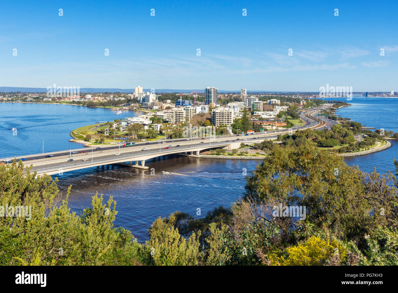 Views of the Narrows Bridge and Kwinana Freeway snaking along the Swan River past South Perth and Como, Western Australia Stock Photo