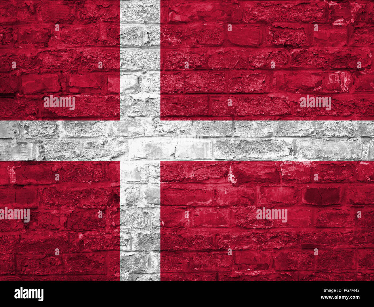 Flag of Denmark over an old brick wall background, surface Stock Photo ...