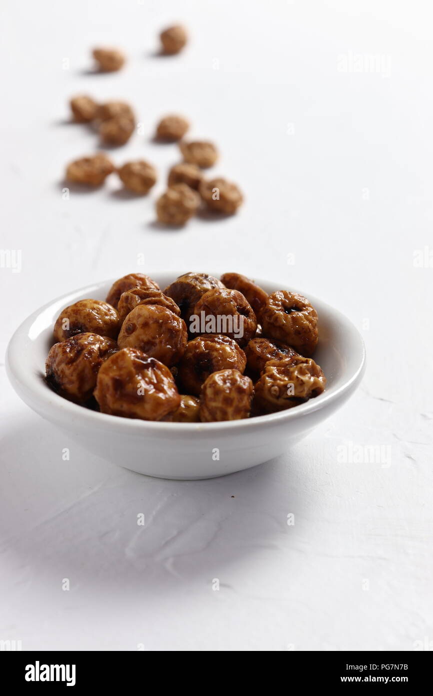 Soaked tiger nuts, used to make traditional Valencian horchata, closeup