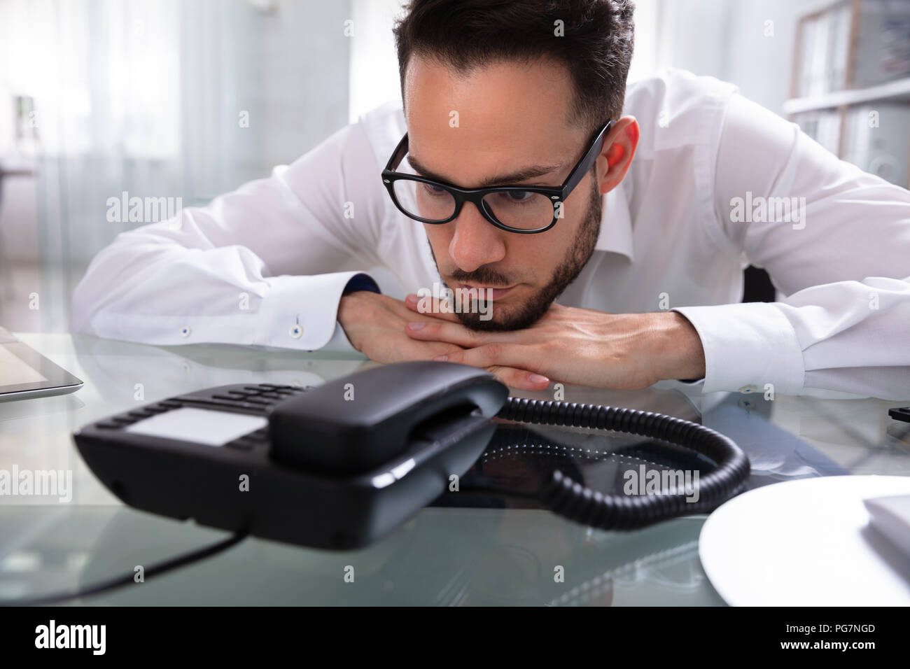 Man on telephone waiting landline hi-res stock photography and images ...