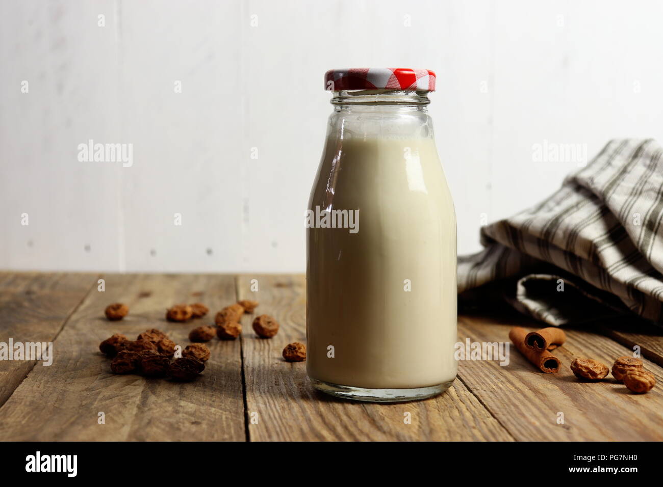 Traditional Spanish horchata made of tiger nuts, non-dairy milk, in a glass bottle, copy space Stock Photo