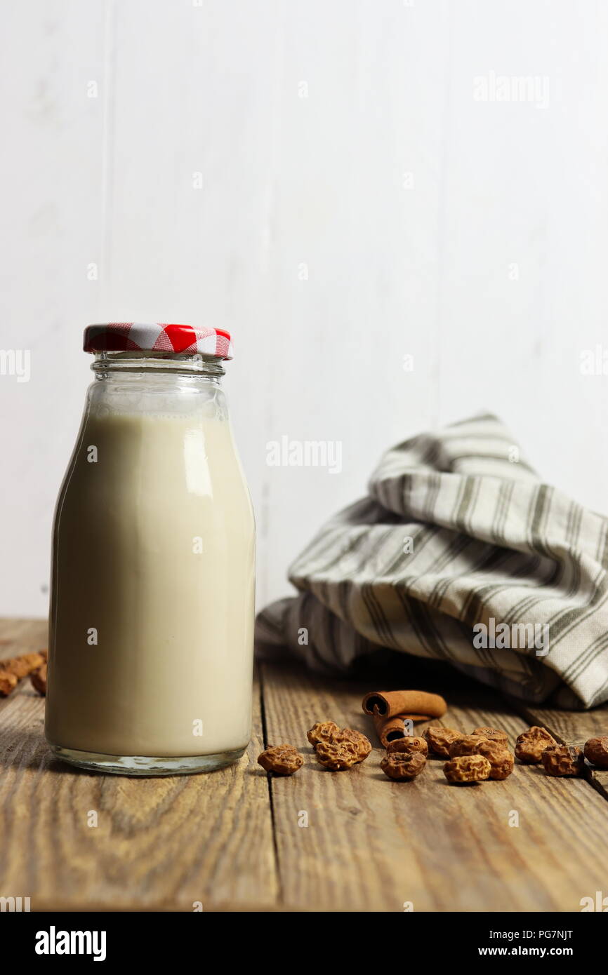 Traditional Spanish horchata made of tiger nuts, non-dairy milk, in a glass bottle, copy space Stock Photo