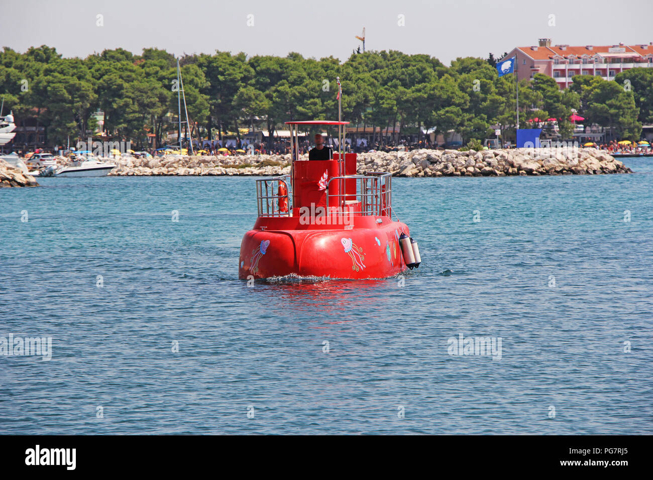 Red Semi-submarine with glass bottom so tourists can see the marine life in Vodice, Croatia Stock Photo