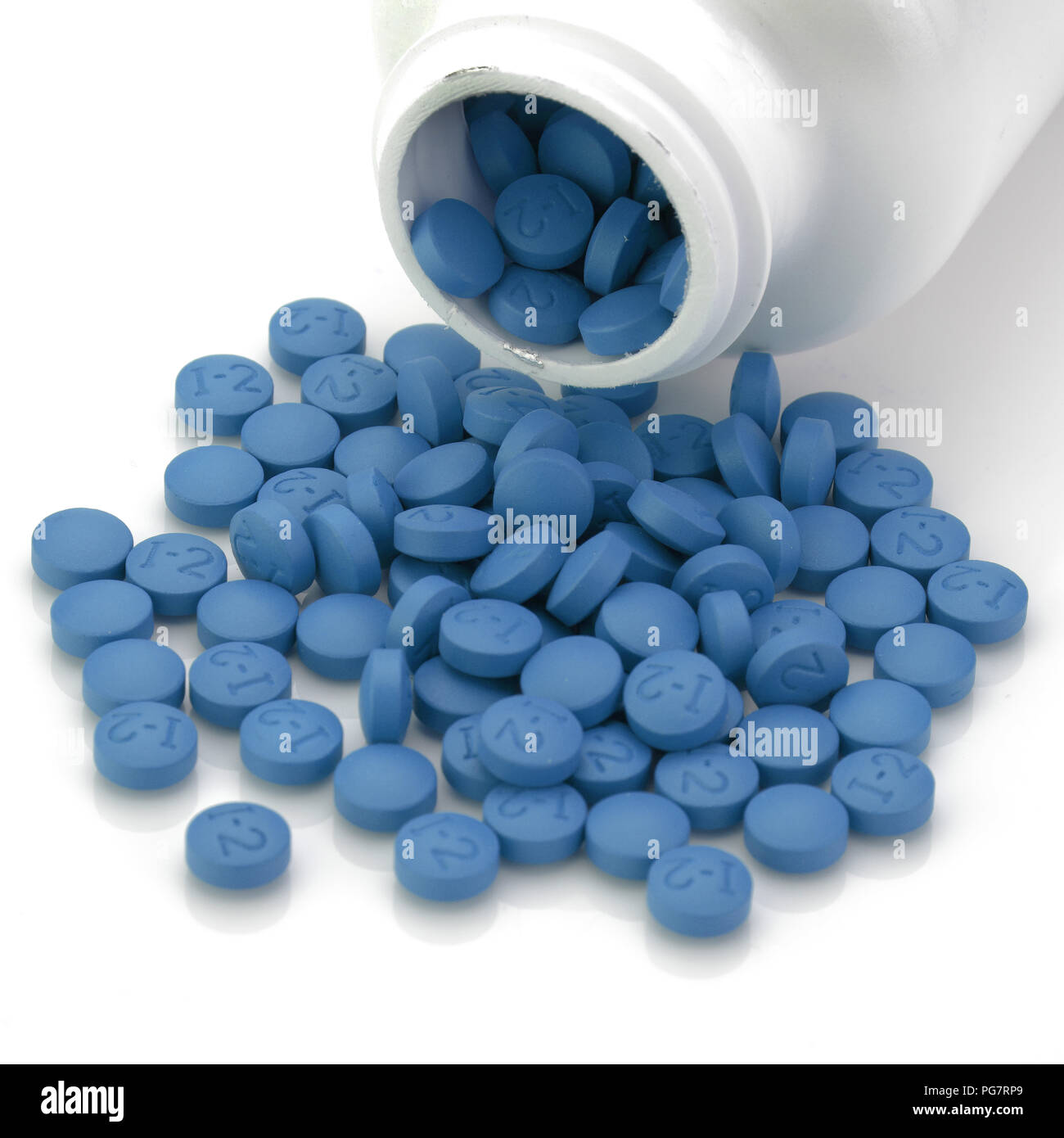 Download A Pile Of Blue Pills And Medication Bottle Stock Photo Alamy Yellowimages Mockups