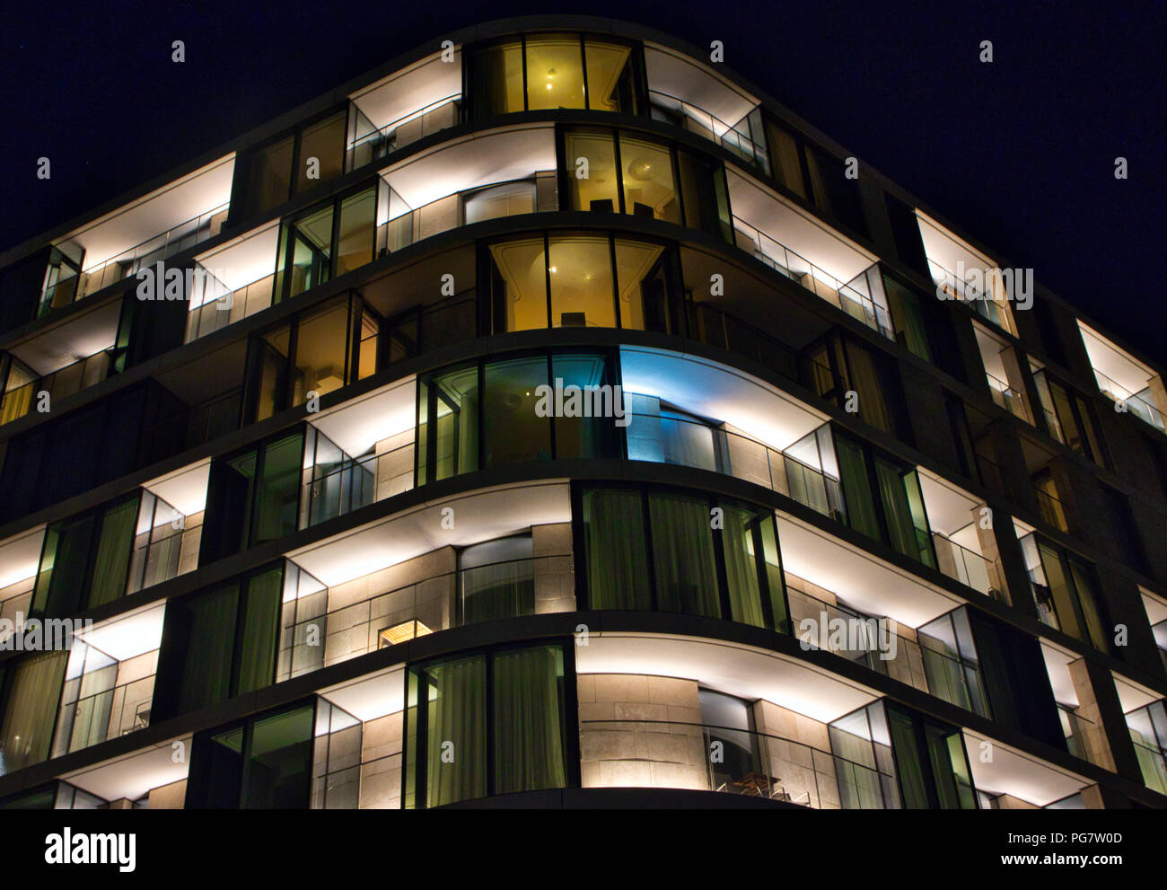 Modern apartments at night Stock Photo Alamy