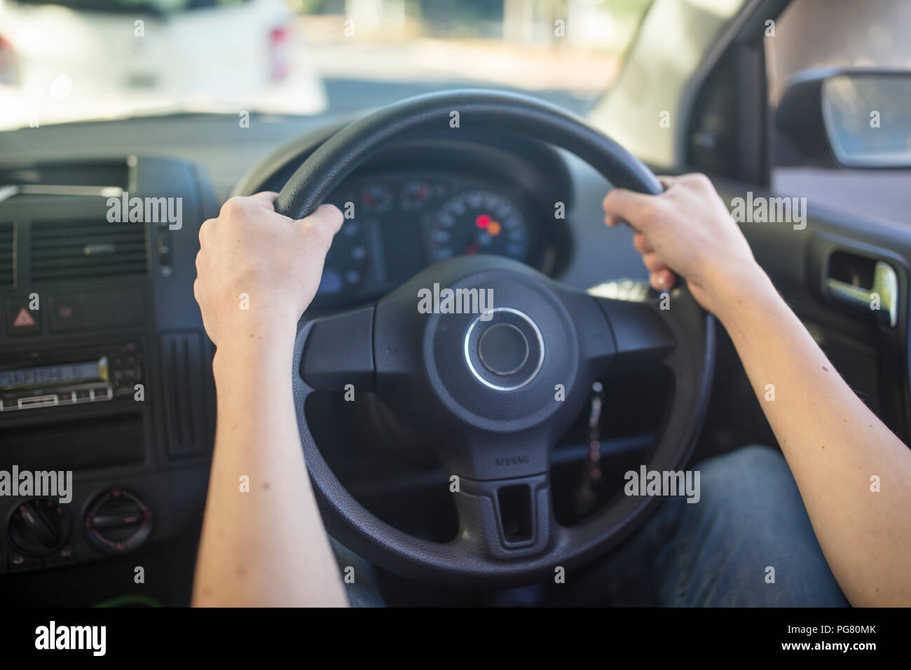 Human hands holding driving license hires stock photography and images