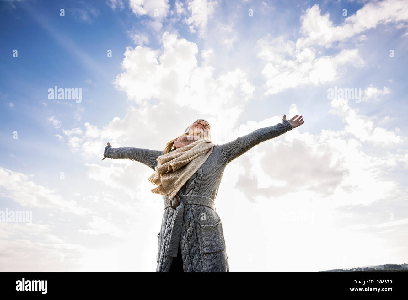 Woman standing outdoors hi-res stock photography and images - Alamy