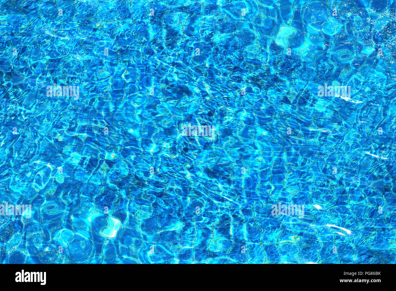 Photo background of bright bubbling blue water Stock Photo