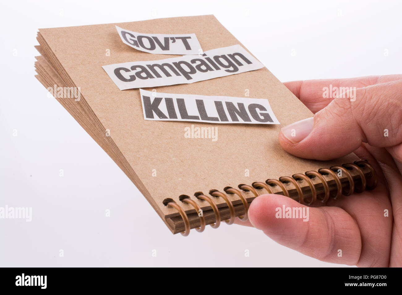 Torn Newspaper Title on a notebook Stock Photo