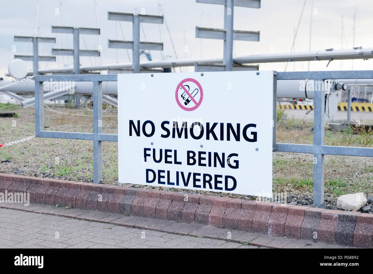 Fuel being delivered no smoking sign at oil and gas refinery Stock Photo