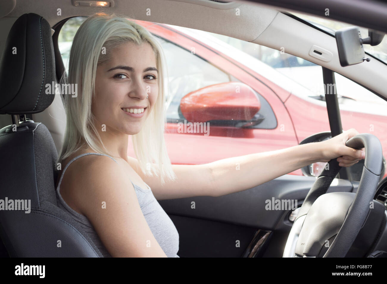 Woman inside convertible car hi-res stock photography and images - Alamy