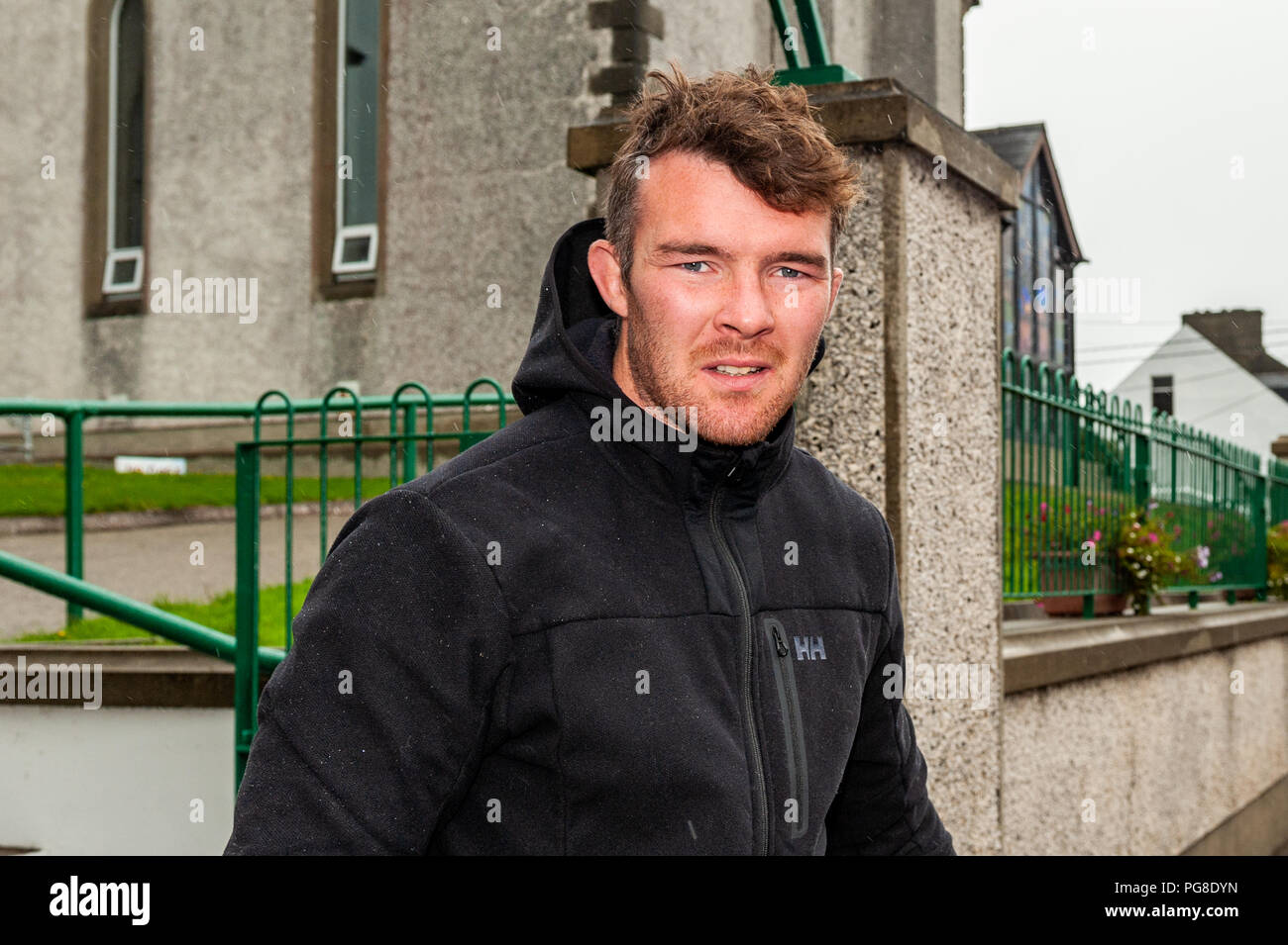 Schull, West Cork, Ireland. 24th Aug, 2018. Newly engaged Munster rugby captain Peter O'Mahony is currently on holiday in Schull. Although it was raining when this picture was taken, Peter said he had a great time in Schull.  He's due to leave Schull on Sunday. Credit: AG News/Alamy Live News. Stock Photo