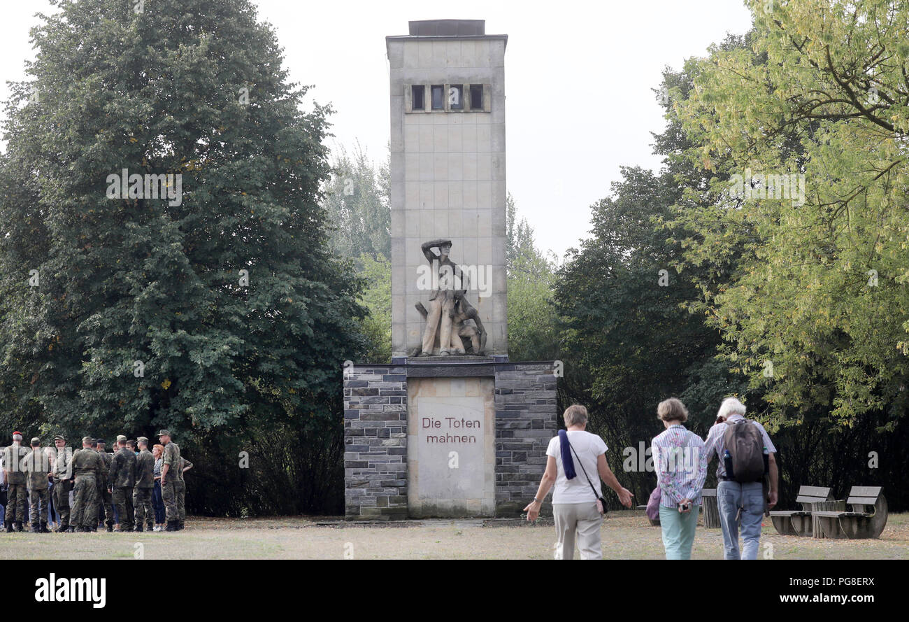 Neubrandenburg, Germany. 24th Aug, 2018. The memorial from GDR times in the Five Oaks Memorial. In 1939 the first Wehrmacht prisoner-of-war camp was built in Fünfeichen in what was then Mecklenburg and Pomerania; after 1945 the 'Special Camp No.9' - one of the largest internment camps of the Soviet secret service NKWD - was there. More than 10,000 people died on the site. Credit: Bernd Wüstneck/dpa/Alamy Live News Stock Photo