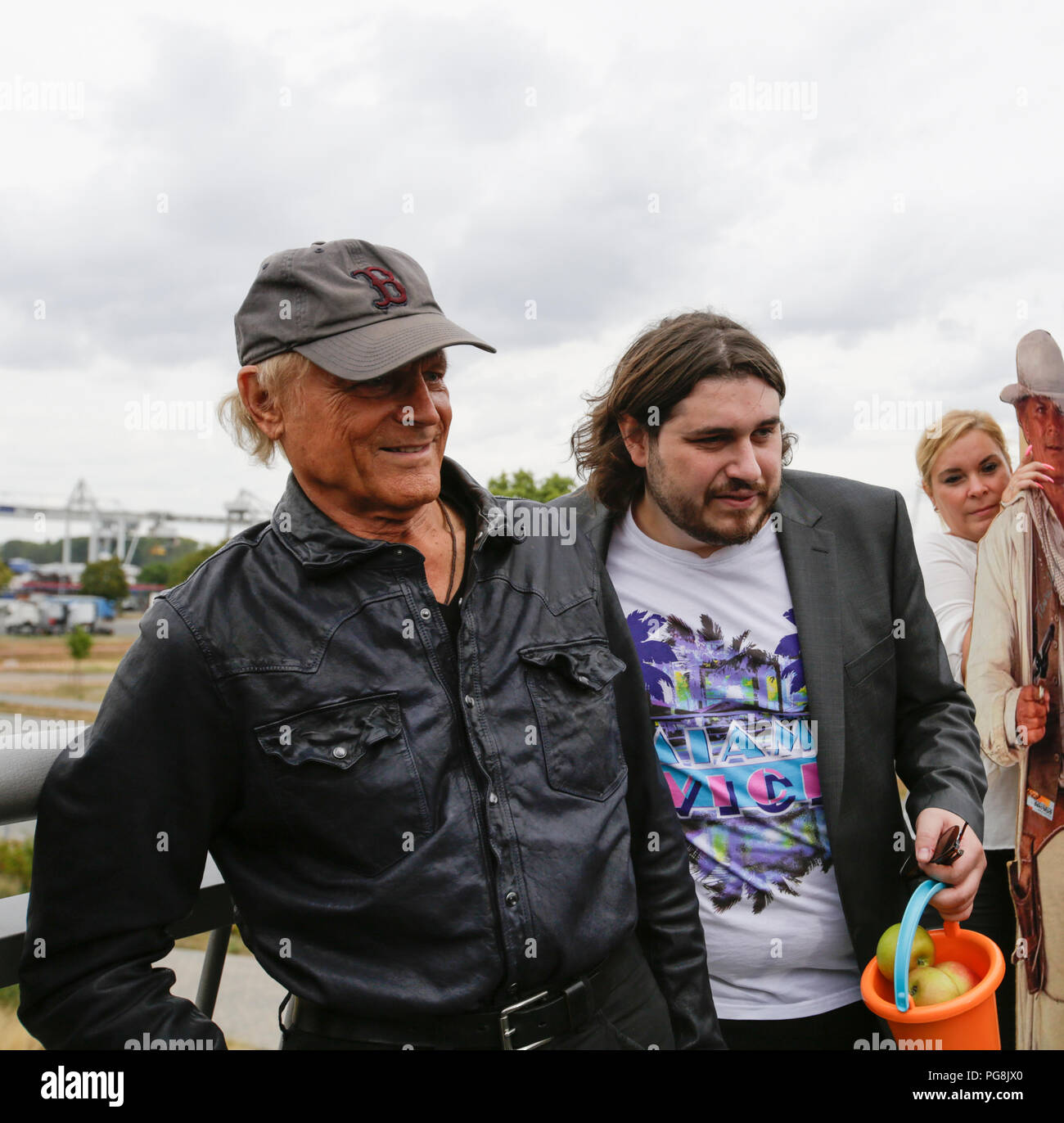 Worms, Germany. 24th August 2018. Terence Hill (left) and actor Peter Englert (right), who initiated the renaming of the bridge to Terence-Hill-Bridge, are pictured on the bridge. Italian actor Terence Hill visited the German city of Worms, to present his new movie (My Name is somebody). Terence Hill added the stop in Worms to his movie promotion tour in Germany, to visit a pedestrian bridge, that is unofficially named Terence-Hill-Bridge (officially Karl-Kubel-Bridge). Stock Photo
