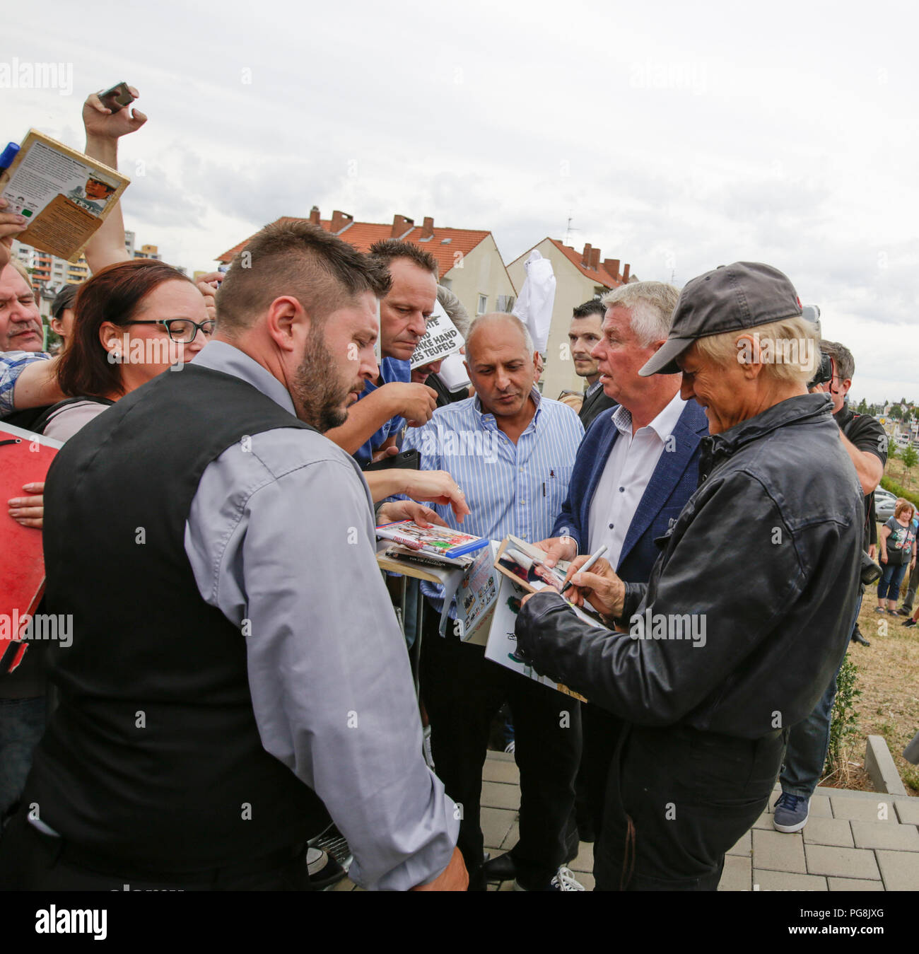 Worms, Germany. 24th August 2018. Terence Hill sign s his autograph for his fans. Italian actor Terence Hill visited the German city of Worms, to present his new movie (My Name is somebody). Terence Hill added the stop in Worms to his movie promotion tour in Germany, to visit a pedestrian bridge, that is unofficially named Terence-Hill-Bridge (officially Karl-Kubel-Bridge). Stock Photo