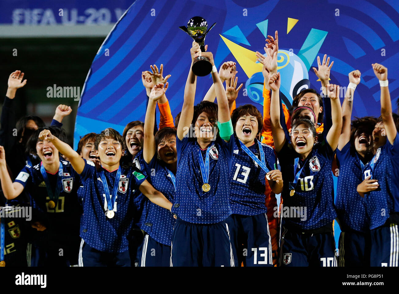 Vannes, France. 24th Aug, 2018. Champion team Japan celebrate during the  awarding ceremony of 2018 FIFA U-20 Women's World Cup in Vannes, France,  Aug. 24, 2018. Japan beat Spain in the final