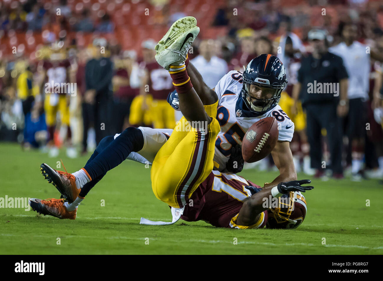 Landover, USA. August 24, 2018: Washington Redskins cornerback Prince Charles Iworah (47) breaks up a pass intended for Denver Broncos wide receiver Mark Chapman (85) during the NFL preseason game between the Denver Broncos and the Washington Redskins at FedExField in Landover, Maryland. Scott Taetsch/CSM Credit: Cal Sport Media/Alamy Live News Stock Photo
